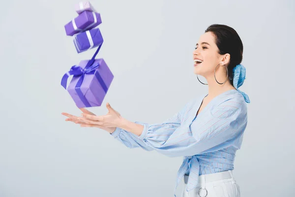 Beautiful Stylish Girl Throwing Air Gift Boxes Smiling Isolated Grey — Stock Photo, Image