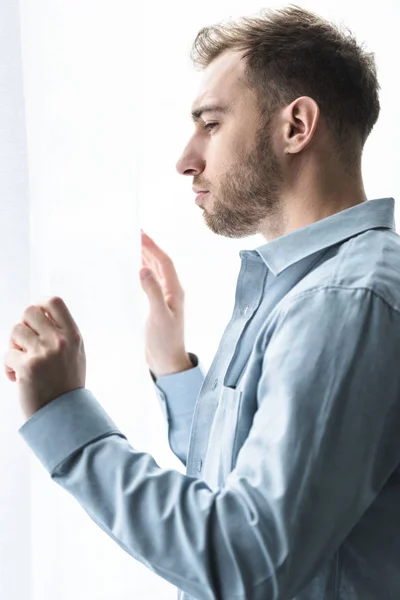 Side View Sad Bearded Man Blue Shirt Looking Away Home — Stock Photo, Image