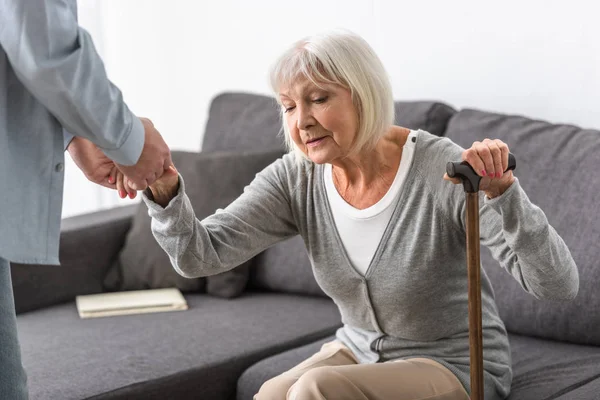 Cropped View Man Helping Senior Mother Living Room — Stock Photo, Image