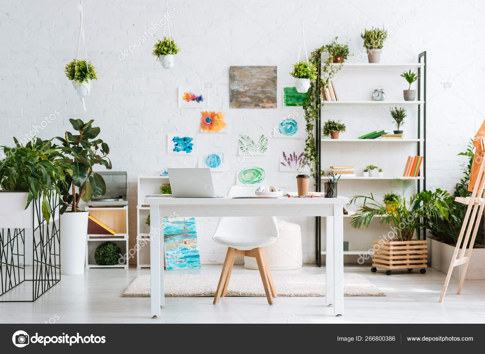 Spacious Room Desk Chair Rack Green Potted Plants Painting
