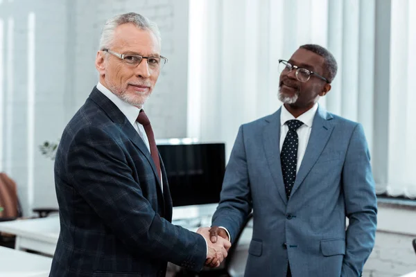 Selective Focus Happy Businessman Glasses Shaking Hands African American Partner — Stock Photo, Image