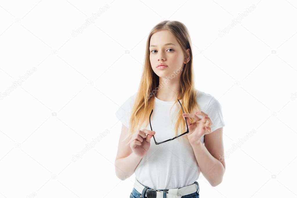 sad teenage girl holding glasses isolated on white