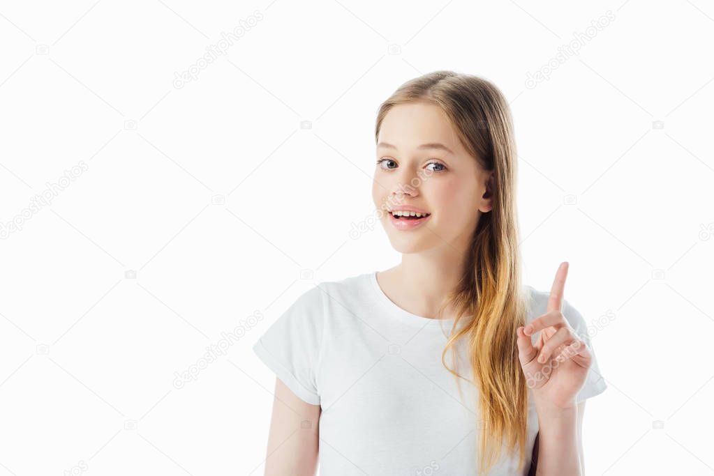 happy teenage girl showing idea gesture and looking at camera isolated on white