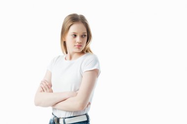 offended teenage girl with crossed arms looking away isolated on white clipart