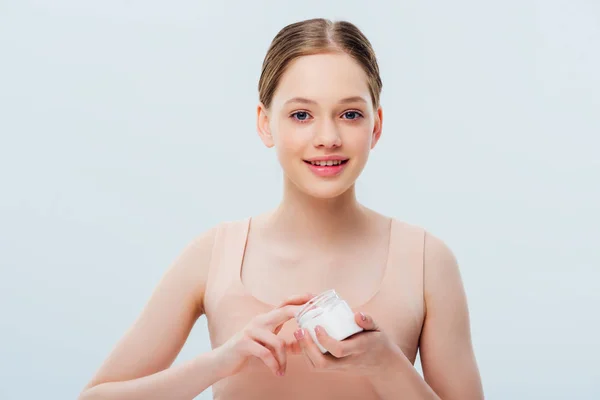 Sorrindo Adolescente Aplicando Dedo Creme Cosmético Isolado Cinza — Fotografia de Stock