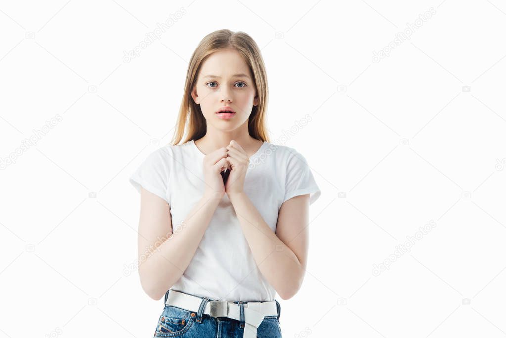scared teenage girl looking at camera isolated on white