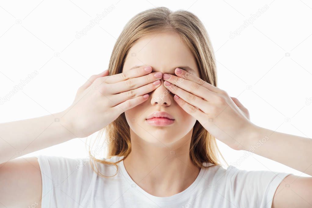 teenage girl covering eyes with hands isolated on white