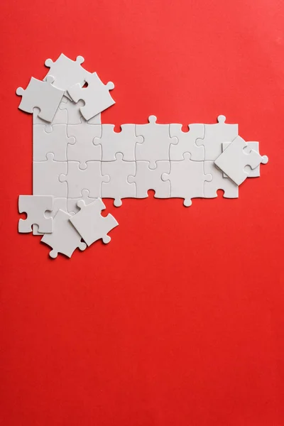 Top View White Connected Puzzle Pieces Shapes Red — Stock Photo, Image