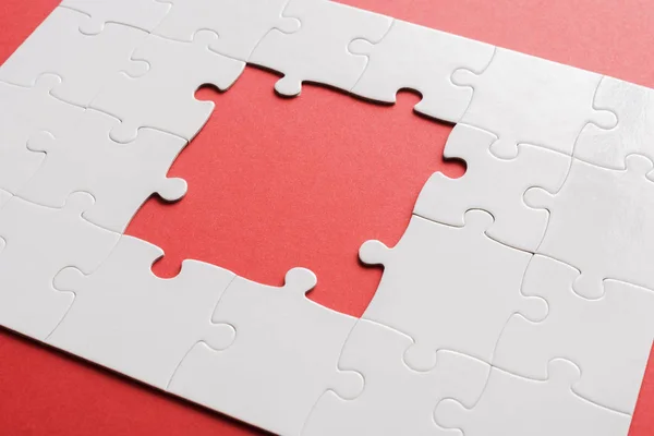 Unfinished Connected White Jigsaw Puzzles Red — Stock Photo, Image