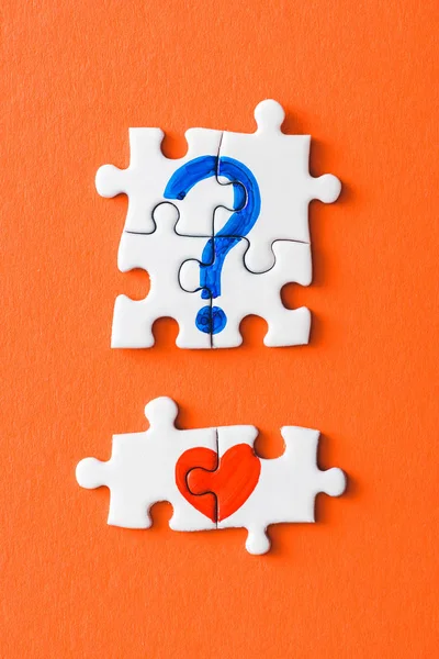 Top View Connected Puzzle Pieces Drawn Red Heart Blue Question — Stock Photo, Image