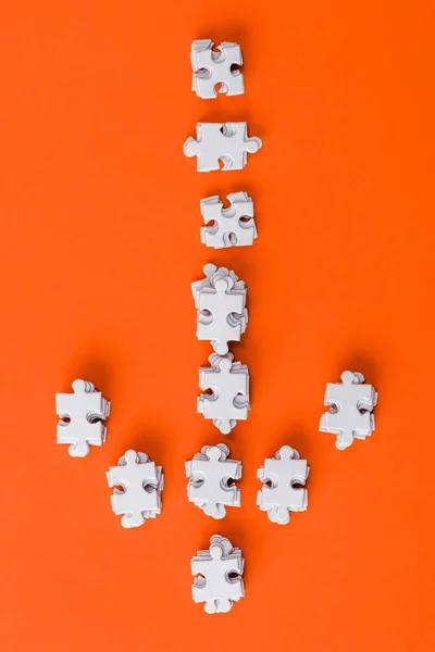 Top View White Direction Arrow Puzzle Pieces Orange — Stock Photo, Image