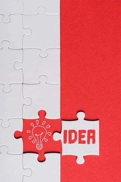 Top View Incomplete Jigsaw White Puzzle Piece Idea Lettering Isolated — Stock Photo, Image