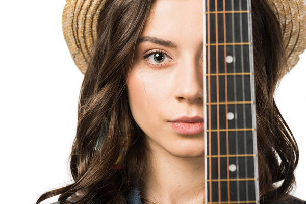 portrait of beautiful hippie girl with acoustic guitar isolated on white