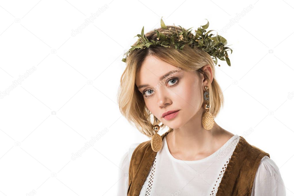 pretty hippie girl wearing earrings and wreath isolated on white
