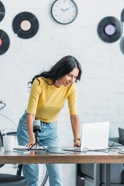 Attractive Radio Host Using Laptop While Standing Wokplace Studio — Stock Photo, Image