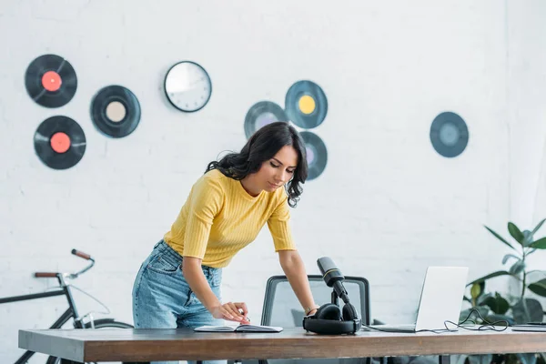 Pretty Radio Host Looking Notebook While Standing Workplace Broadcasting Studio — Stock Photo, Image