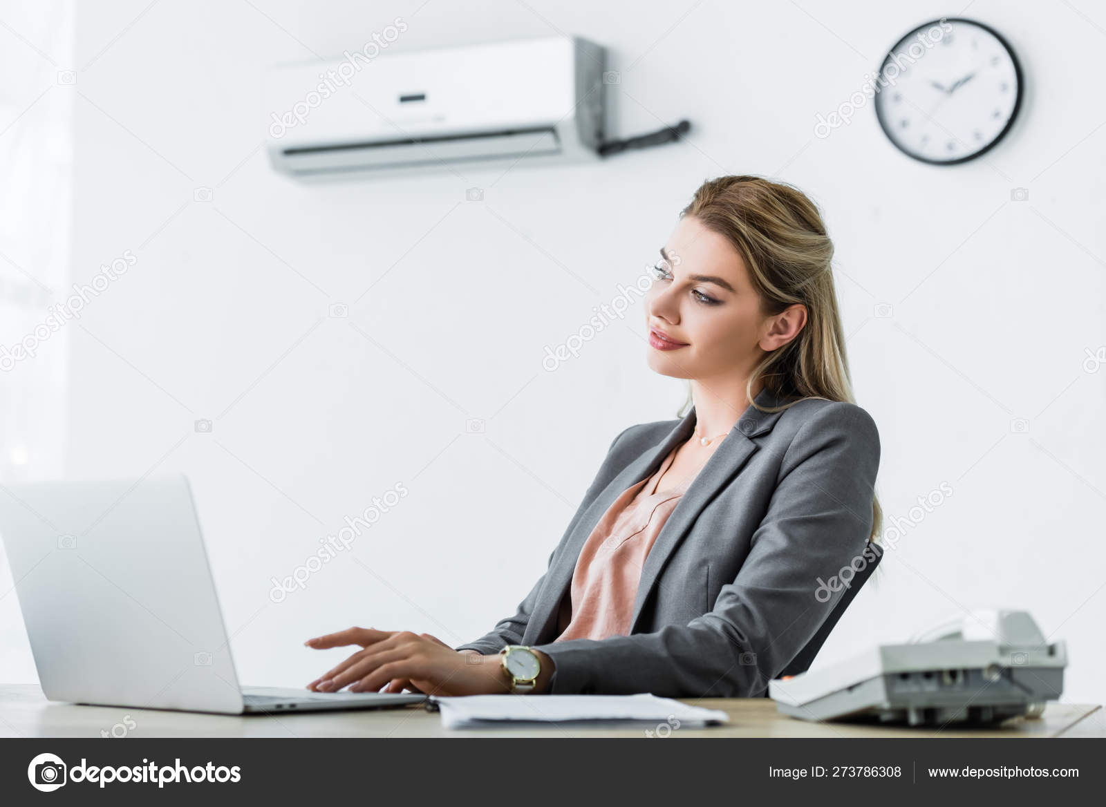Happy Businesswoman Sitting Office Air Conditioner Usinglaptop Stock Photo  by ©AndrewLozovyi 273786308
