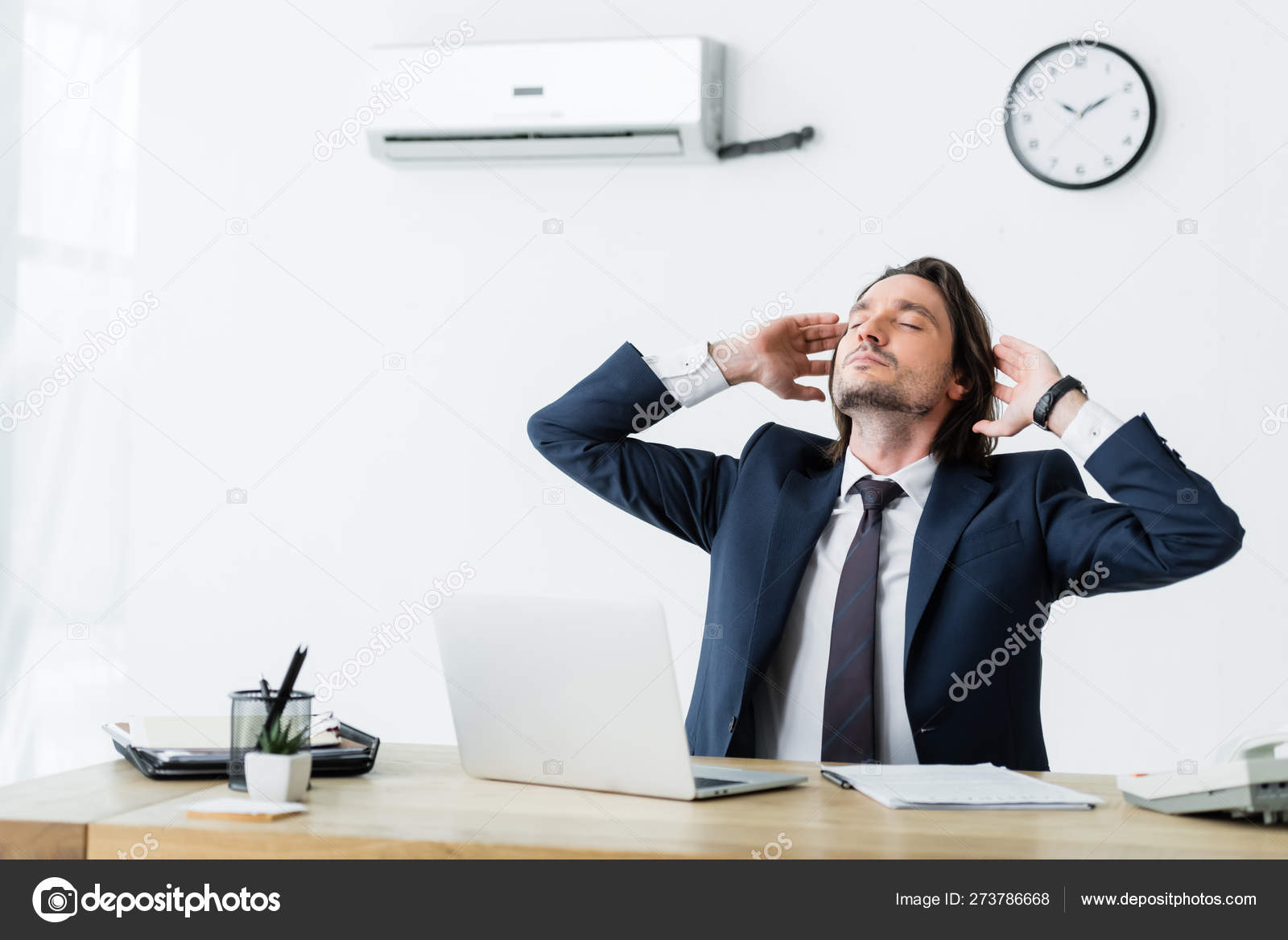 Businessman Sitting Office Air Conditioner Holding Hands Head Stock Photo  by ©AndrewLozovyi 273786668