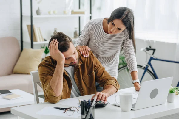 Beautiful Woman Calming Upset Handsome Man Apartment — Stock Photo, Image