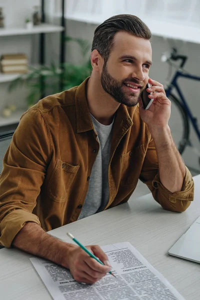 Handsome Man Talking Smartphone Holding Pencil Apartment — Stock Photo, Image