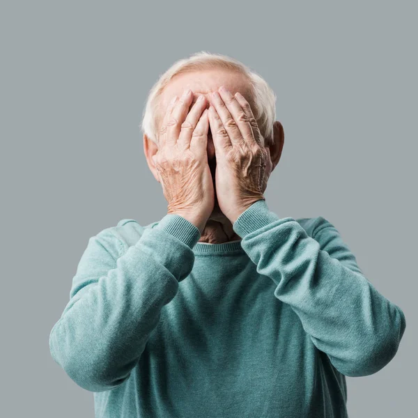Senior Man Grey Hair Covering Face Hands Isolated Grey — Stock Photo, Image