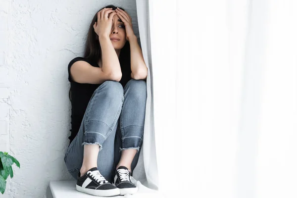 Scared Young Woman Suffering Panic Attack While Sitting Window Sill — Stock Photo, Image