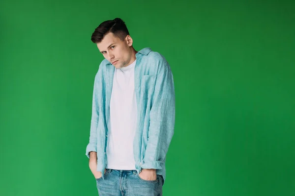 Confused Young Man Shirt Standing Hands Pockets Looking Camera Isolated — Stock Photo, Image