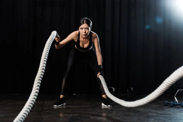 Selective Focus Attractive Sportswoman Exercising Battle Ropes Black — Stock Photo, Image