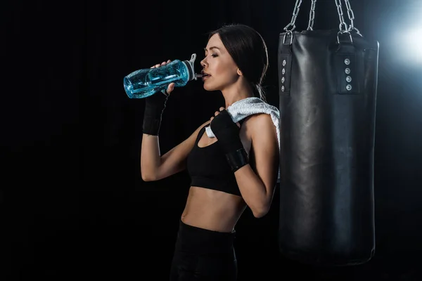 Girl Drinking Water Sport Bottle Standing Punching Bag Isolated Black — Stock Photo, Image