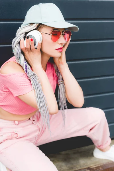 Attractive Stylish Girl Dreadlocks Headphones Posing Wall — Stock Photo, Image