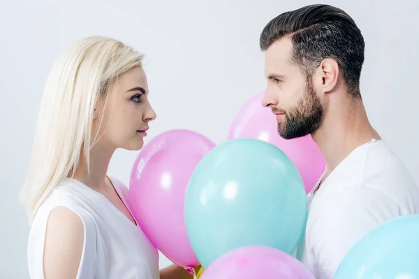 Man Beautiful Girl Balloons Looking Each Other Isolated Grey — Stock Photo, Image