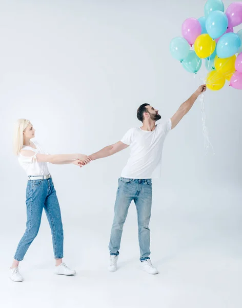 Beautiful Girl Holding Hand Handsome Man Balloons Grey — Stock Photo, Image