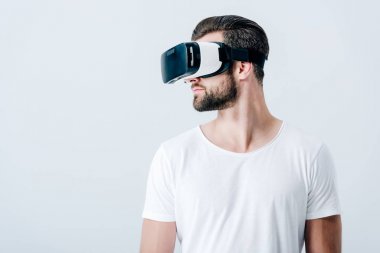 bearded man in Virtual reality headset isolated on grey with copy space clipart
