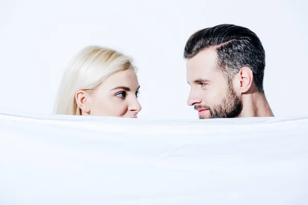 Girlfriend Boyfriend Looking Each Other Holding Blanket Isolated White — Stock Photo, Image