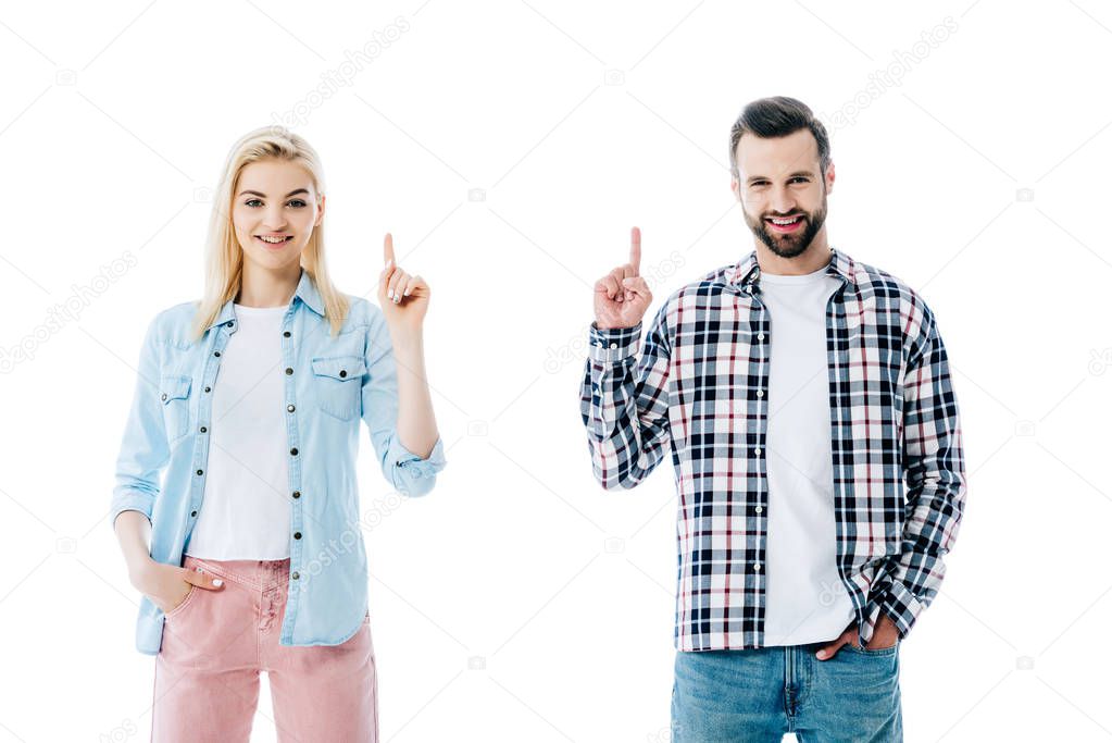 happy girl and man pointing with fingers up Isolated On White