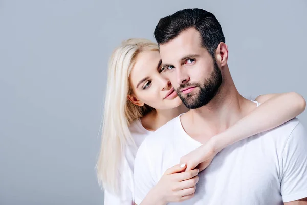 Beautiful Girl Embracing Man Looking Camera Isolated Grey — Stock Photo, Image