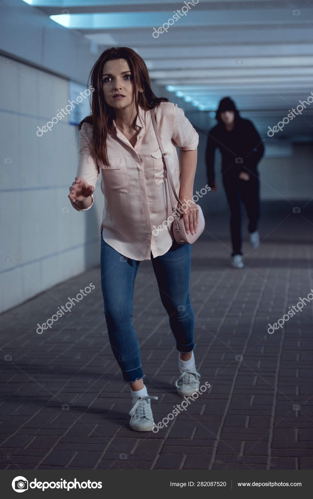 depositphotos_282087520-stock-photo-frightened-woman-running-away-thief.jpg