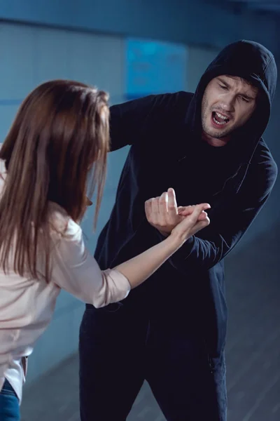 Woman Defending Herself Attacking Thief Black Hoodie Underpass — Stock Photo, Image