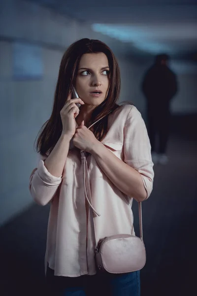 Selective Focus Stressed Woman Talking Smartphone Thief Underpass — Stock Photo, Image