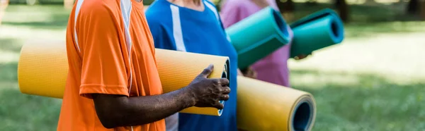 Panoramic Shot Senior Multicultural Pensioners Holding Fitness Mats — Stock Photo, Image