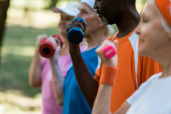 Cropped View Multicultural Group Senior Men Women Exercising Dumbbells — Stock Photo, Image