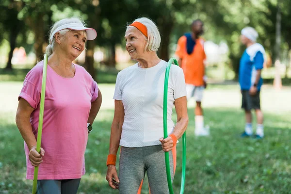 Selective Focus Cheerful Senior Women Smiling While Holding Hula Hoops — Stock Photo, Image