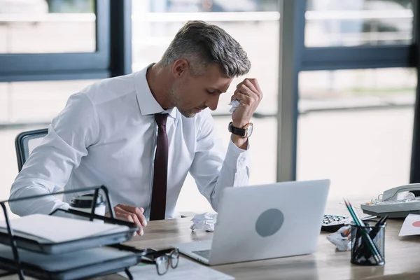 Selective Focus Upset Man Holding Crumpled Paper Ball Laptop Stock Picture
