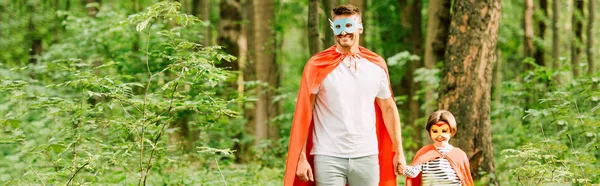 Panoramic Shot Father Son Holding Hands While Standing Green Forest — Stock Photo, Image