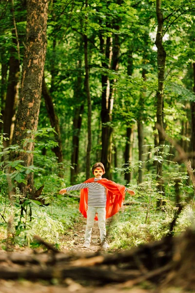 Selective Focus Small Boy Superhero Costume Mask Standing Forest — Stock Photo, Image