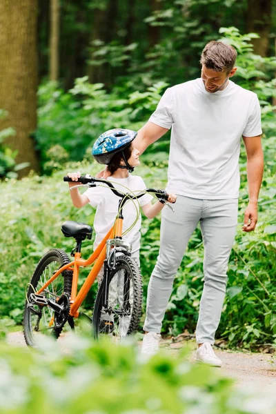 Selective Focus Father Son Standing Road Forest While Looking Each — Stock Photo, Image