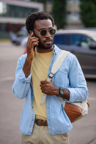 Handsome African American Man Sunglasses Looking Away While Talking Smartphone — Stock Photo, Image