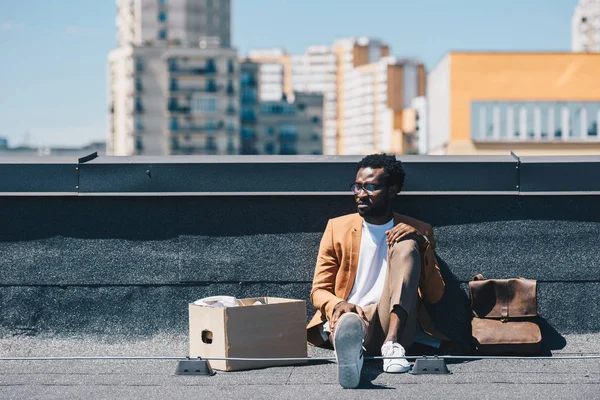 Fired African American Businessman Sitting Rooftop Carton Box — Stock Photo, Image