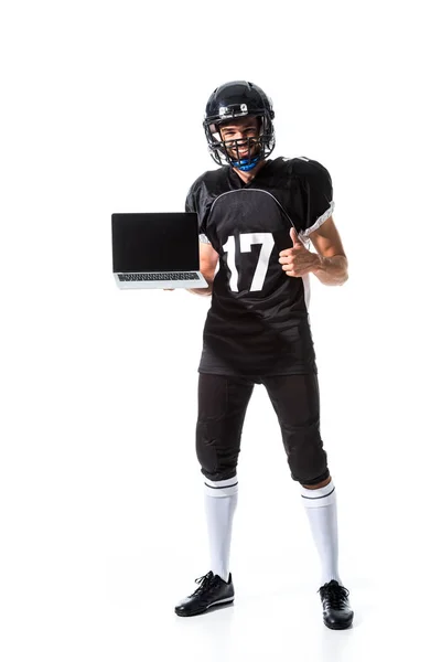 American Football Spieler Mit Laptop Zeigt Daumen Nach Oben Isoliert — Stockfoto