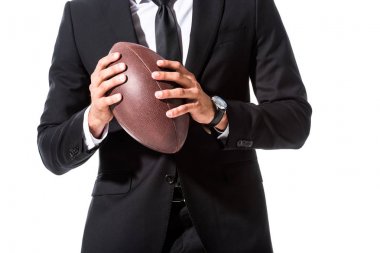 Rugby topu ile resmi aşınma işadamı kırpılmış görünümü beyaz üzerinde Izole